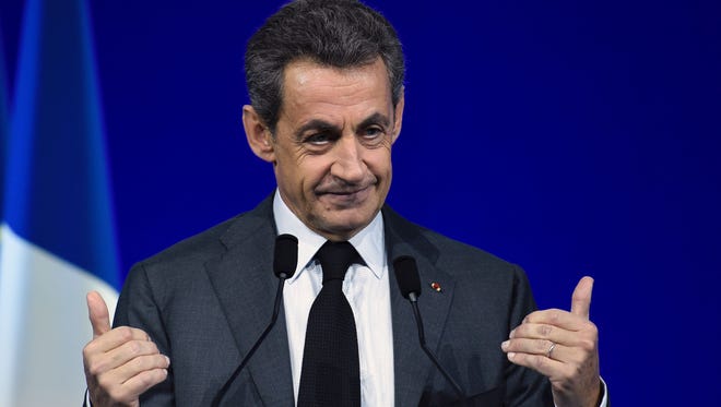 This file photo taken on February 13, 2016 shows former French president and Les Republicains (LR) right-wing main opposition party's leader Nicolas Sarkozy giving a speech during the LR National Council in Paris.