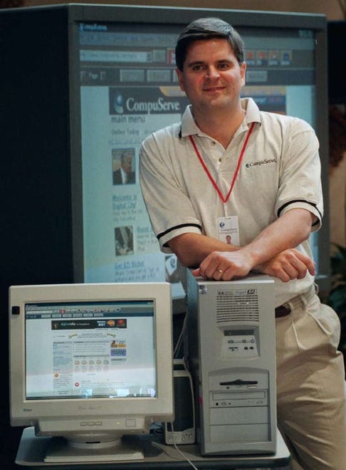 Steve Case, chairman and CEO of America Online, came to CompuServe's headquarters on Sept. 29, 1998, to announce AOL's continued support of the company. [The Associated Press file photo]