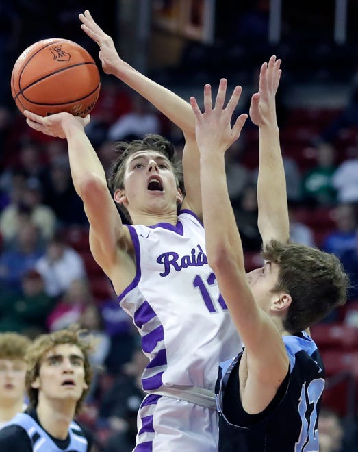 Kiel High School's Aidan Murphy (12) against Lakeside Lutheran High School's Easton Wolfram (12) in a Division 3 semifinal game during the WIAA state boys basketball tournament on Thursday, March 14, 2024 at the Kohl Center in Madison, Wis.
Wm. Glasheen USA TODAY NETWORK-Wisconsin