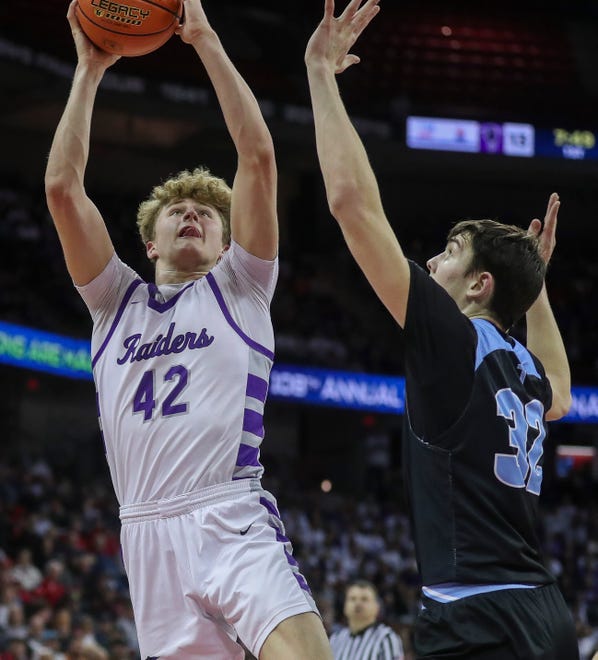 Kiel High School's Grant Manz (42) puts up a shot against Lakeside Lutheran High School in a Division 3 semifinal game during the WIAA state boys basketball tournament on Thursday, March 14, 2024 at the Kohl Center in Madison, Wis. Lakeside Lutheran won the game, 57-55.