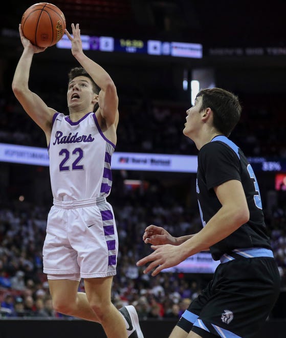 Kiel High School's Pierce Arenz (22) puts up a shot against Lakeside Lutheran High School in a Division 3 semifinal game during the WIAA state boys basketball tournament on Thursday, March 14, 2024 at the Kohl Center in Madison, Wis. Lakeside Lutheran won the game, 57-55.