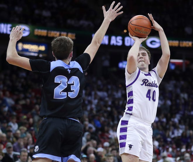 Kiel High School's Jack Heckmann (40) shoots a 3-pointer against Lakeside Lutheran High School in a Division 3 quarterfinal game during the WIAA state boys basketball tournament on Thursday, March 14, 2024 at the Kohl Center in Madison, Wis. Lakeside Lutheran won the game, 57-55.