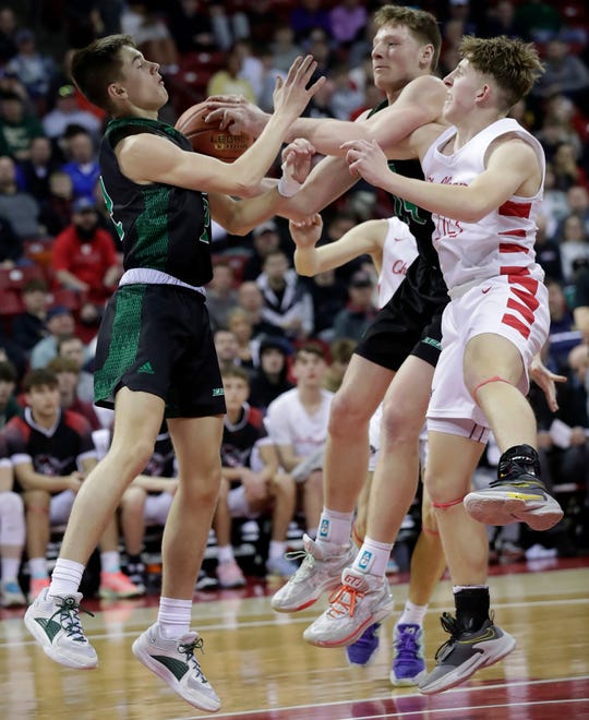 Almond-Bancroft High School's Brody Dernbach (2) and Ayden Phillips (15) against Abundant Life Christian School's Nolan Wallace (14) in a Division 5 semifinal game during the WIAA state boys basketball tournament on Friday, March 15, 2024 at the Kohl Center in Madison, Wis.
Wm. Glasheen USA TODAY NETWORK-Wisconsin