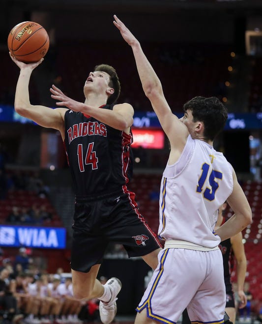 Marathon High School's Tyler Underwood (14) puts up a shot against Kenosha St. Joseph Catholic Academy in a Division 4 semifinal game during the WIAA state boys basketball tournament on Thursday, March 14, 2024 at the Kohl Center in Madison, Wis. Kenosha St. Joseph Catholic won the game, 46-37.