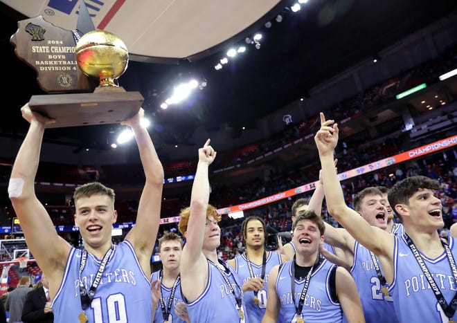 Mineral Point High School players hoist the gold ball after winning the Division 4 championship game during the WIAA state boys basketball tournament on Saturday, March 16, 2024 at the Kohl Center in Madison, Wis. Mineral Point High School defeated Kenosha St. Joseph 65-64.
Wm. Glasheen USA TODAY NETWORK-Wisconsin