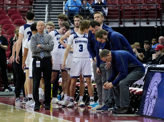 Lakeside Lutheran head coach Todd Jahns substitutes out the starter players as they get close to the end of the WIAA Division 3 boys basketball state championship game against St. Thomas More on Saturday March 16, 2024 at the Kohl Center in Madison, Wis.
