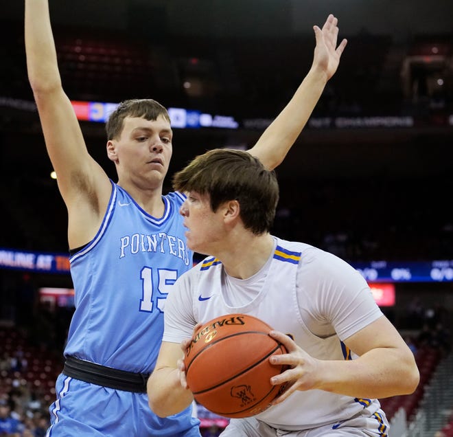 Mineral Point's Brady Radtke (15) guards Kenosha St. Joseph's Dominic Santarelli (23) during the first half of the WIAA Division 4 boys basketball state championship game on Saturday March 16, 2024 at the Kohl Center in Madison, Wis.