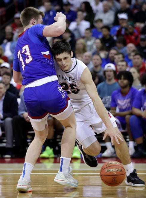 Wisconsin Lutheran High School's Kon Knueppel (33) against Pewaukee High School's Nick Janowski (25) in a Division 2 championship game during the WIAA state boys basketball tournament on Saturday, March 16, 2024 at the Kohl Center in Madison, Wis.
Wm. Glasheen USA TODAY NETWORK-Wisconsin