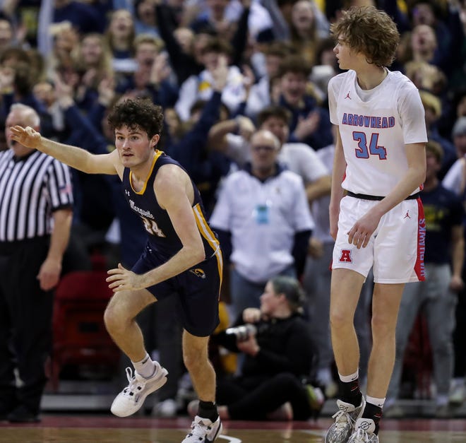 Marquette University High School's Ryan Meehan (24) reacts after hitting a 3-pointer against Arrowhead High School in the Division 1 state championship game during the WIAA state boys basketball tournament on Saturday, March 16, 2024 at the Kohl Center in Madison, Wis. Marquette won the game, 84-62.