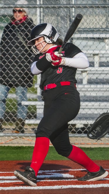 Wauwatosa East's Mary Peplinski (5) connects for a double to left field during the game at Wauwatosa West, Thursday, March 21, 2024. Wauwatosa East won 14-4.
