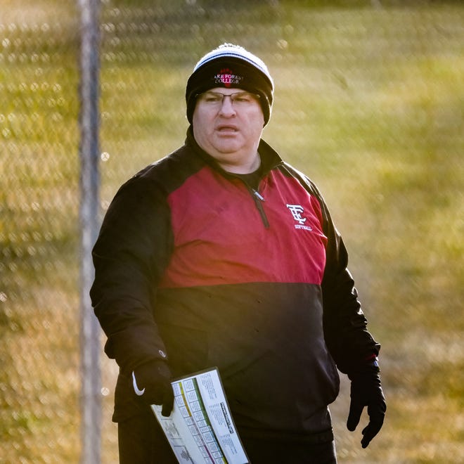 Wauwatosa East head coach Shawn Grimm follows the action during the game at Wauwatosa West, Thursday, March 21, 2024. Wauwatosa East won 14-4.