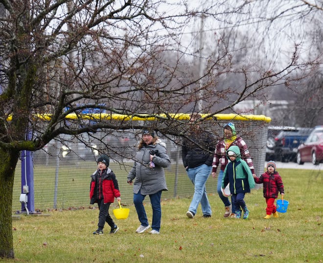 Families arrive early for the annual Okauchee Lions Easter Egg Hunt at Lions Park on Saturday, March 30, 2024. The free family event, hosted by the Okauchee Lions Club, features separate hunts for each age group.