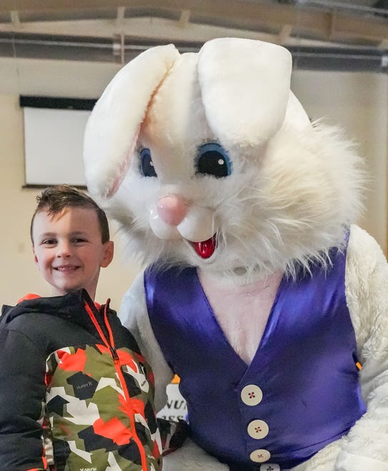 Brandon Eckert, 5, of Oconomowoc, poses for a photo with the Easter Bunny prior to the annual Okauchee Lions Easter Egg Hunt at Lions Park on Saturday, March 30, 2024. The free family event is hosted by the Okauchee Lions Club.