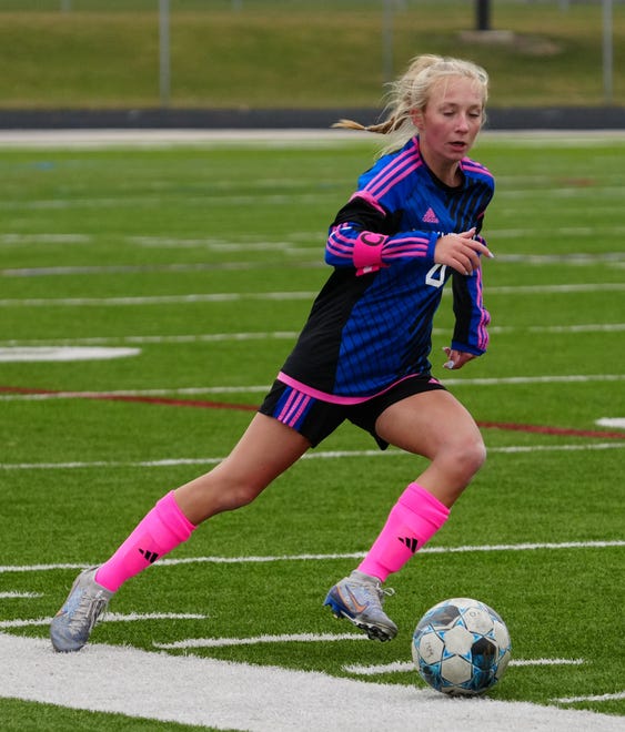 Waukesha West's Megan Thomsen (4) races downfield during the match at home against Kettle Moraine Lutheran on Saturday, March 30, 2024.