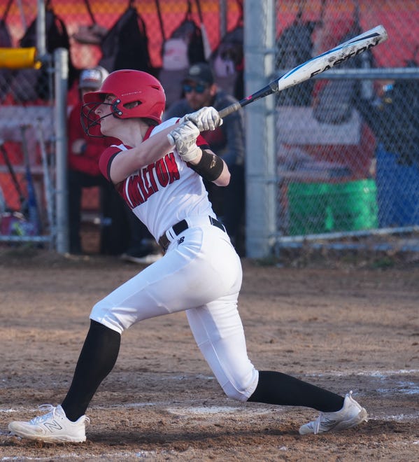 Sussex Hamilton's Lauren Bickler (5) connects for an RBI single to center during the game at home against Divine Savior Holy Angels on Tuesday, April 9, 2024.