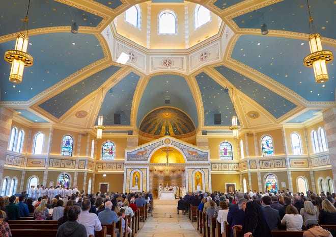 St. Charles Parish in Hartland opened its new church April 6. Its seating capacity is 1,230 and it boasts many historical architectural features.
