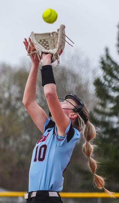 Arrowhead pitcher Sammie Radish (10) pulls in a pop fly during the game at home against Oconomowoc, Tuesday, April 16, 2024.