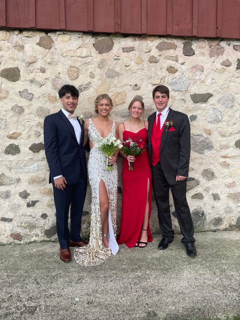 Arrowhead High School students (from left) Ben Bamba and his date Payton Eicher pose with Addi Kowalewski and her date Hayden Russ before their prom on Saturday, April 27, 2024.