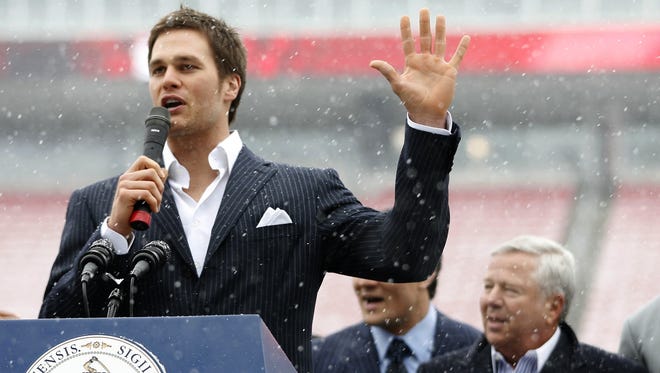Brady speaks to a crowd at a sendoff rally at Gillette Stadium before Super Bowl XLII in 2008.