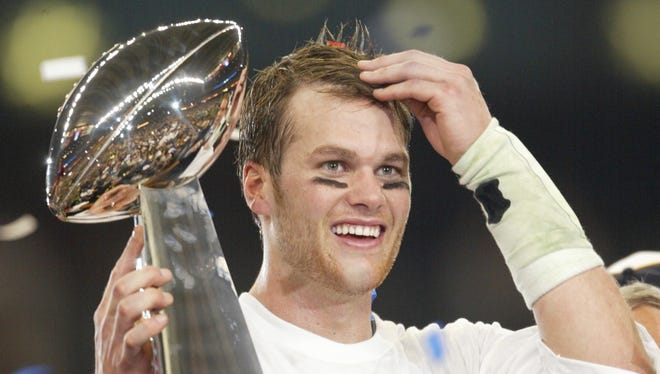 Brady celebrates after the Patriots' 32-29 win over the Carolina Panthers in Super Bowl XXXVIII in Houston, Brady's second title.