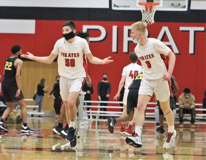 Pewaukee guard Nick Janowski reacts after hitting a three during Pewaukee's 59-point first half against Brown Deer during a WIAA sectional semifinal on Feb. 25, 2021.