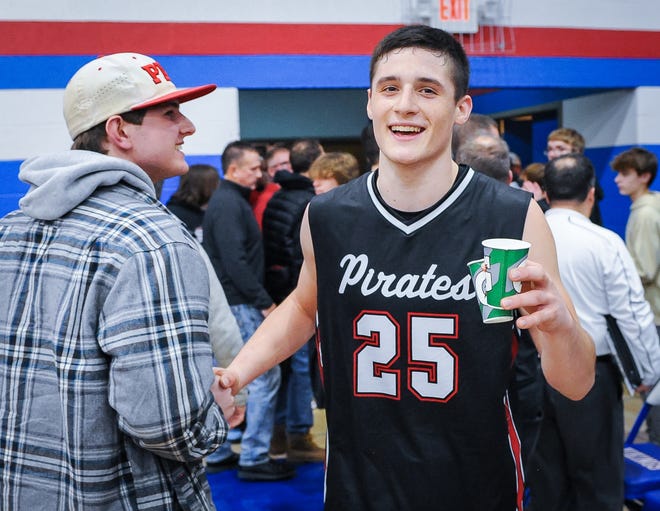 Pewaukee guard Nick Janowski (25) is congratulated as he walks off the court after a 75-67 victory over Wisconsin Lutheran on Tuesday January 3, 2023, at Wisconsin Lutheran High School in Milwaukee, Wisconsin.