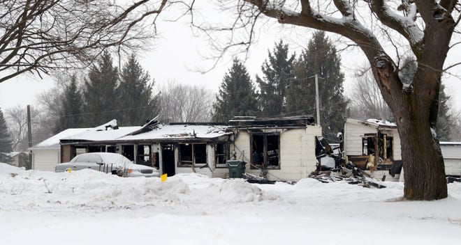 The scene of a home destroyed by fire at S15 W22398 Arcadian Ave. in the Town of Waukesha on Wednesday, Feb. 20, 2019. The early morning fire killed three people, and injured three others on Tuesday, Feb. 19.
