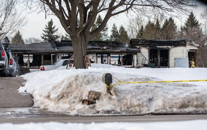 A charred shell is all that remains from a fatal town of Waukesha house fire at S15 W22398 Arcadian Ave. on Tuesday, Feb. 19, 2019. The early morning blaze killed three occupants and injured three others.