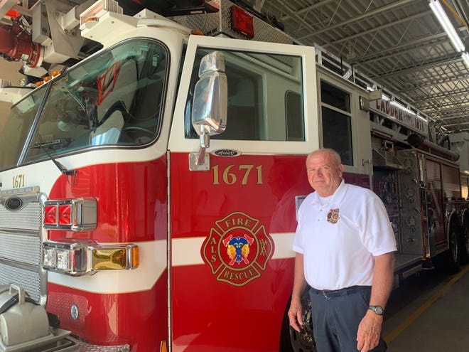 Waukesha Village Fire Chief Daniel Buchholtz stands alongside the $750,000 ladder truck the then-town acquired several years ago to enhance its fire protection services. Buccholtz will retire from his full-time post Sept. 1, ending his 20-year tenure as chief and 47 years with the department.